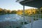 Looking at a pond from a white garden house / gazebo / arbour in Queensland, Australia