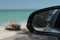 Looking at rear mirror while driving along the Casey Key Beach