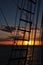 Looking through the rigging on a sailing boat at sunset