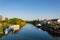 Looking at the River Severn on an autumn day from the bridge at Upton Upon Severn, UK