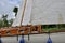 Looking at the side of a traditional wooden sailing yacht