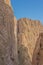 Looking at the steep walls of the Todra Gorge