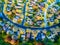 Looking straight down Over Modern Suburb Home Community with Fall Colors Curved Streetes