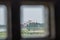 Looking at Taj Mahal from the window of Agra fort