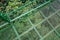 Looking to the ground from green hanging bridge in Rainforest of Monteverde