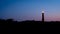 Looking towards the Schiermonnikoog lighthouse after sundown Friesland, the Netherlands