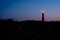 Looking towards the Schiermonnikoog lighthouse after sundown Friesland, the Netherlands