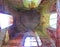 Looking up in brick arched window bell tower