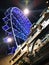 Looking up at a Ferris wheel