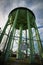 Looking Up at Giant Green Water Tower