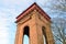 Looking up at large victorian water tower