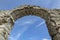 Looking up. Part of the Arch of the ancient fortress of Cape Kaliakra above the sea against the background of the azure sky. North