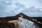 Looking up the path to the peak of Win Hill in the snow, in Hope Valley, Peak District, Derbyshire