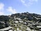 Looking up rocky path to walkers