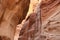 Looking up from the sandstone path through the Siq, Petra, Jordan