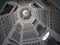 Looking up the stairwell with arms on the walls the armouries Leeds Yorkshire England