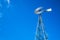 Looking Up at Tall Metal Water Pumping Windmill