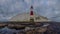 Looking up to Beachy Head light and cliff - a stitched panorama taken from below the light house at Beachy Head, East Sussex, UK