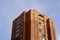 Looking up to red (orange) brick with many windows, Lasnamae, Tallinn, Estonia, Europe. 2024