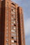 Looking up to red (orange) brick with many windows, Lasnamae, Tallinn, Estonia, Europe. 2024