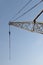 Looking upward at a crane derrick