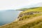 Looking West along the beautiful Jurassic Coast on a summer afternoon from a cliff top path near the Dancing Ledge