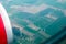 Looking through window aircraft. High-angle view from airplane