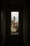 Looking through a window watching Firenze tower skyline