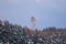 The lookout tower above the snow covered pine forest