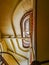 Lookup to spiral staircase in old tenement house