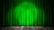 Loop light on green fabric curtain