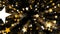 Looped animation of gold confetti in shape of star.