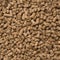 Looped Close-up Rotation of Compacted Wooden Sawdust Pellets - Natural Cat Litter Filler or Organic Fuel.