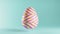 Looped Easter egg video with rotating parts. CGI animation, blue, yellow and pink pastel colors