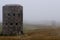 Loophole tower in the fog