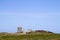 Loophole towers in Guernsey that guard the coastline.