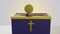 looping animation of gold coin going into an alms box for tithe