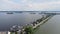 Loosdrecht Loosdrechtse Plassen aerial drone view on a summer day houses and road dyck road running through the water.