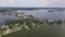 Loosdrecht Loosdrechtse Plassen aerial drone view on a summer day houses and road dyck road running through the water.