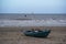 loose canoe is located on the beach on the North Sea at Hoek van Holland