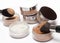 Loose cosmetic powder different colors with makeup brushes