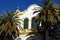 Lope de Vega theatre and palm trees, Seville, Spain.