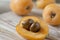 Loquat fruits on a wooden board