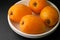 Loquats in bowl closeup