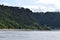 Lorelei rock under heavy light clouds