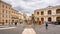 LORETO, Marches, Italy - juli 16, 2016: The medieval stone fountain with bronze dragons, in the Madonna Square with the Apostolic