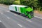 Lorry belonging to the British Waitrose Supermakret in motion on the motorwey M25