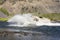 Lorry - a gasoline tanker crossing a river in a mountainous area in a remote region of Eastern Siberia.