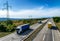 Lorry trucks passing by on a country highway