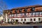 Lorsch, Germany - October 2020: Ice cream parlor `Dolomiti` in old traditional half timbered building with toursits